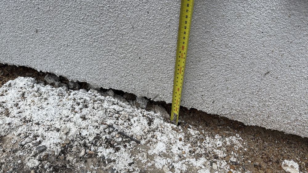 Less than the 150mm clearance needed between the cladding and the soil, found during a pre-handover inspection in Wollert