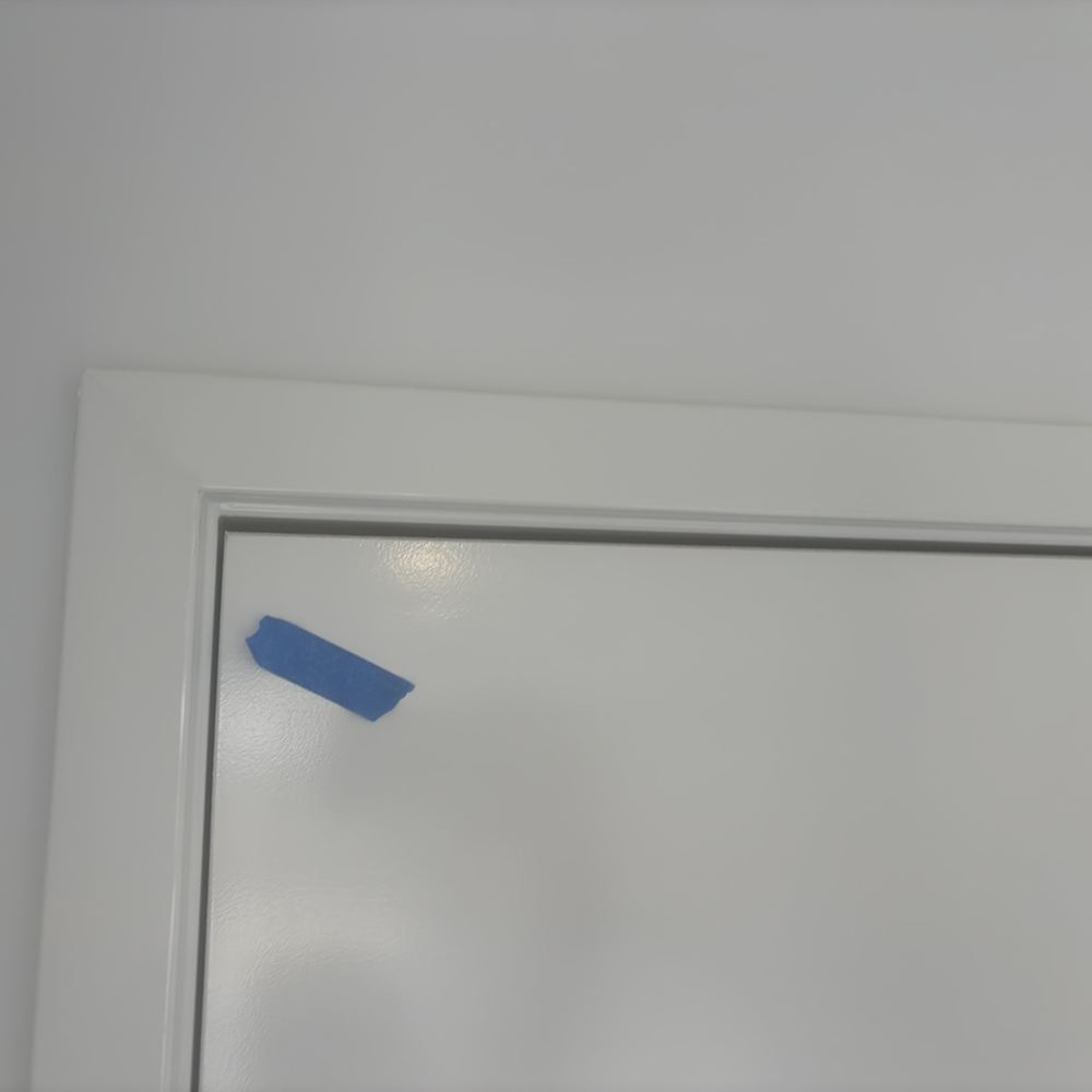 Uneven gaps between the door frames and leaves, found during a building inspection in Wollert