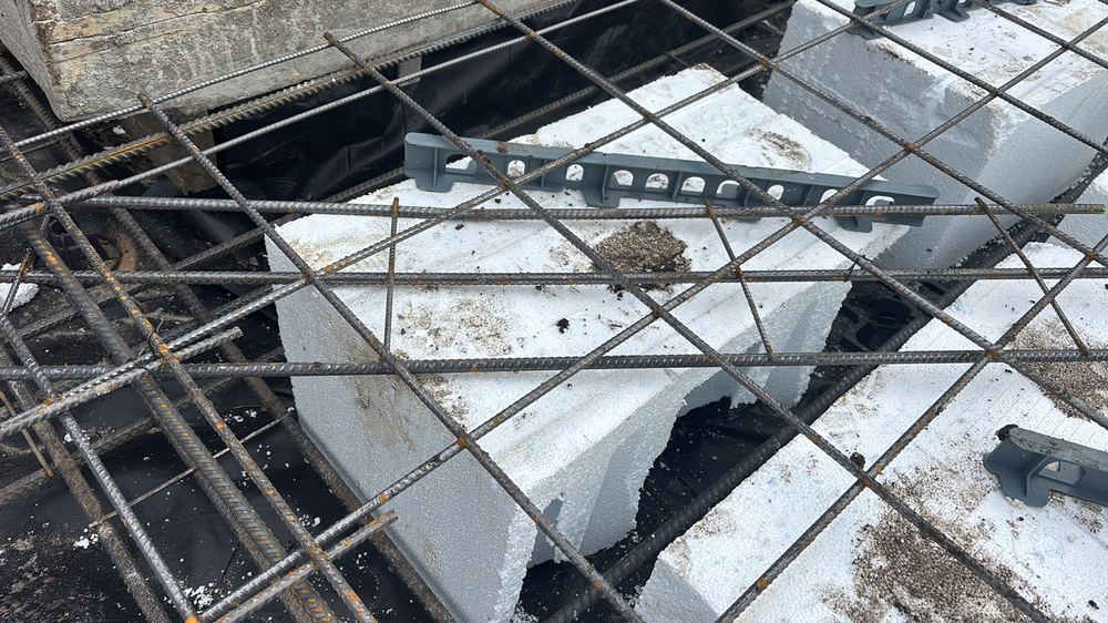 Not enough concrete cover over the steel, which lets the reinforcement corrode, Wollert