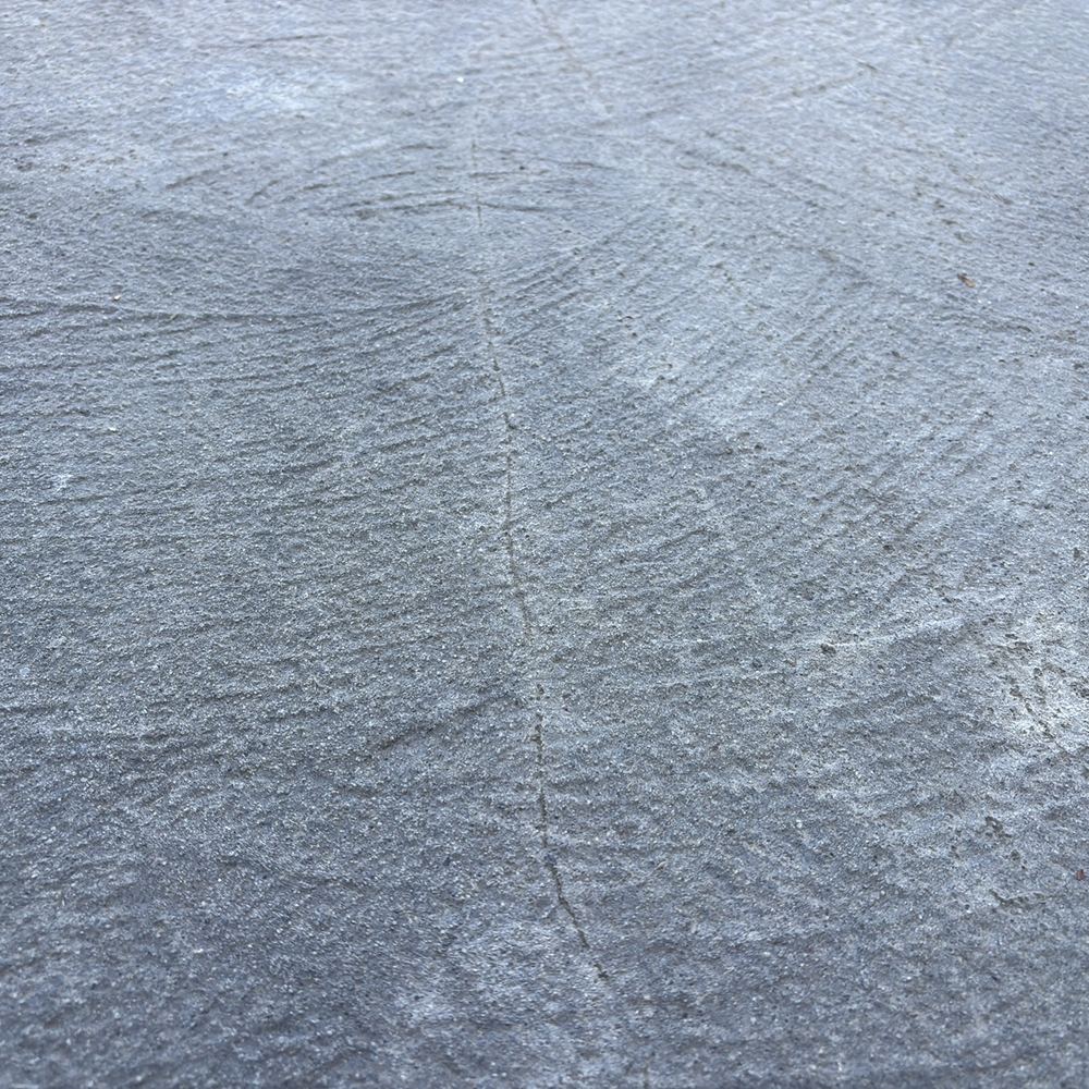 Driveway or path concrete chipped and damaged in places, Wollert