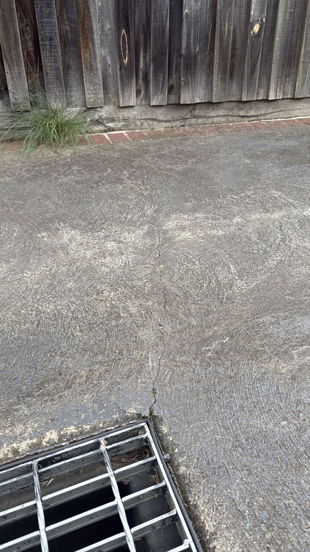 Moderate cracking, likely from too few control joints for the concrete to move, found during a pre-purchase inspection in Preston