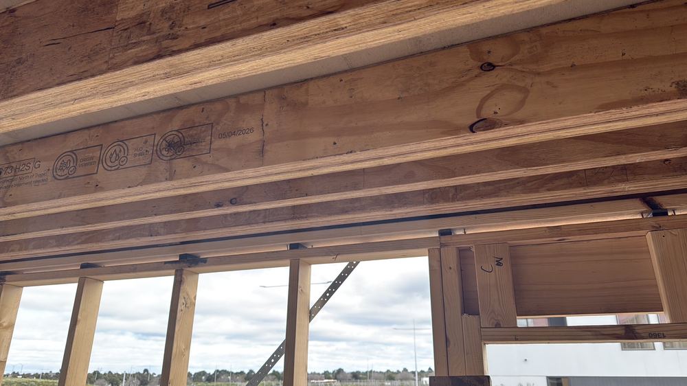 Heavy use of plastic packers to level the upper floor framing, needing engineer confirmation, Wollert