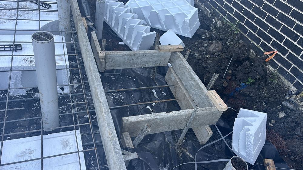 Hot water service mesh not yet in place under the slab area, found during a bored pier inspection in Wollert