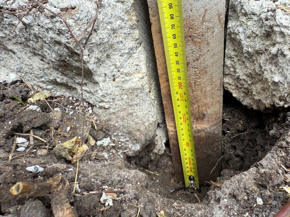 Fence post set less than 200mm into the ground, well short of proper depth, found during a defect investigation inspection in Donnybrook