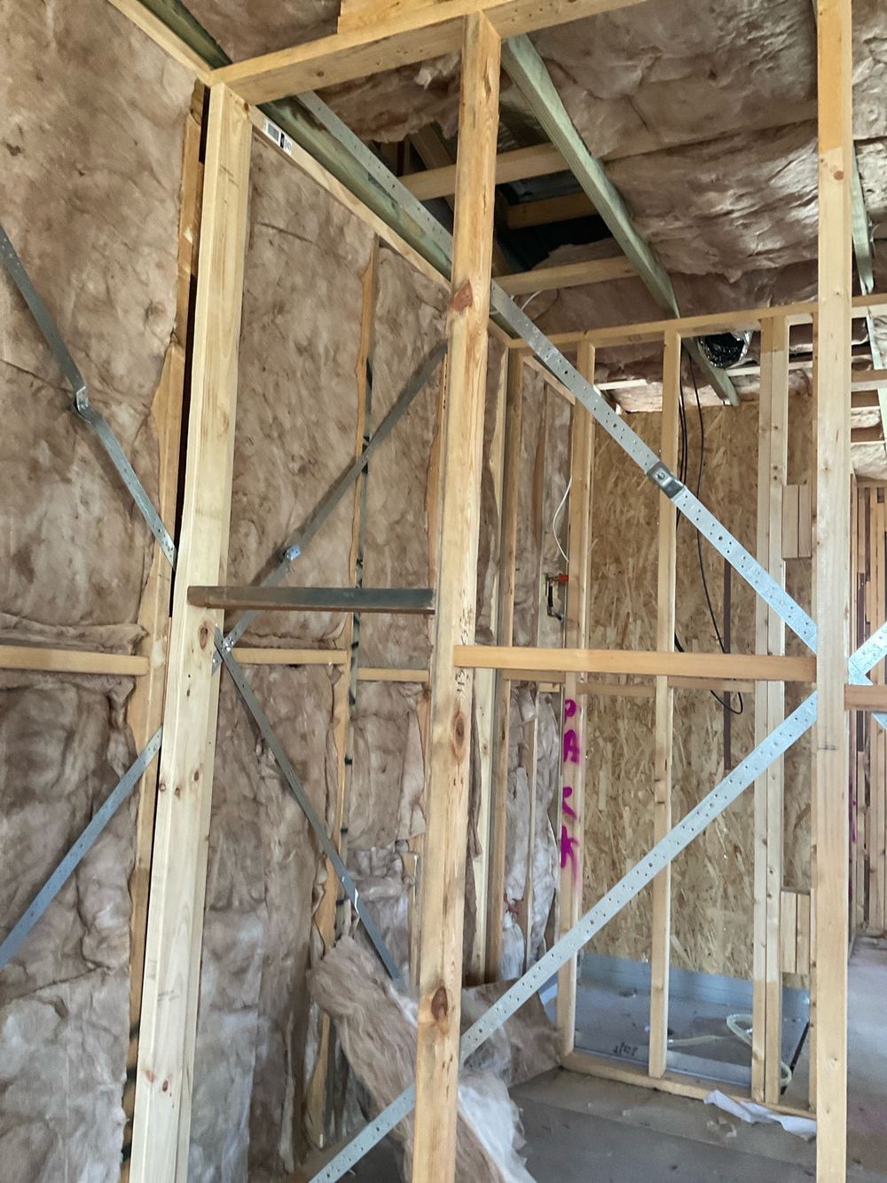 Insulation batts loose or fallen out, which cuts the home's energy rating, found during a lock-up inspection in Wollert