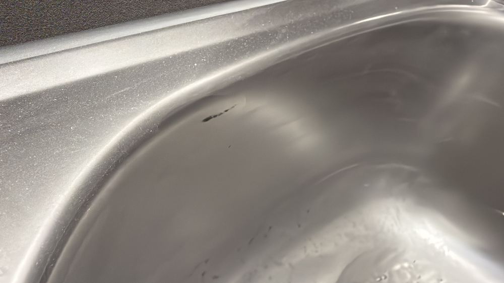 Marks and damage on the sink surface needing repair or replacement, Wollert