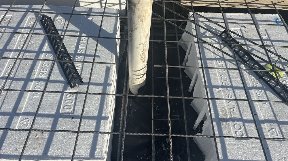 N16 bars missing where the top slab mesh is cut for service penetrations, found during a slab pre-pour inspection in Wollert