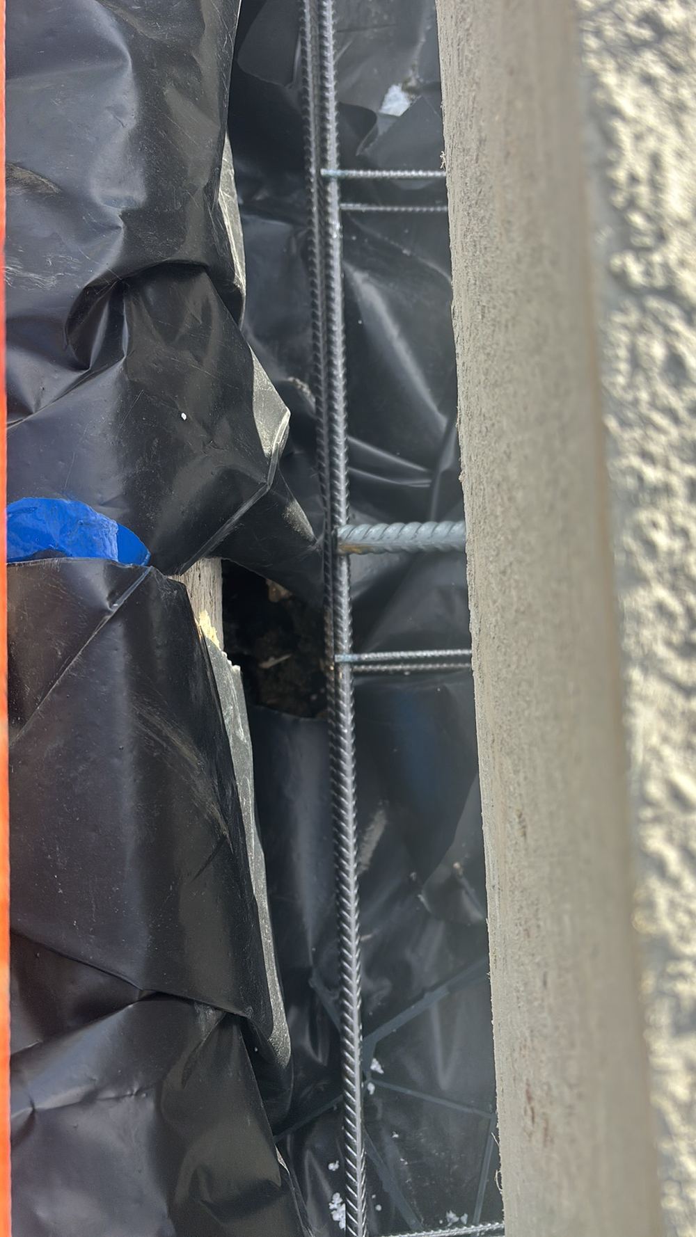 Service penetrations through the moisture barrier not taped or sleeved, found during a slab pre-pour inspection in Wollert